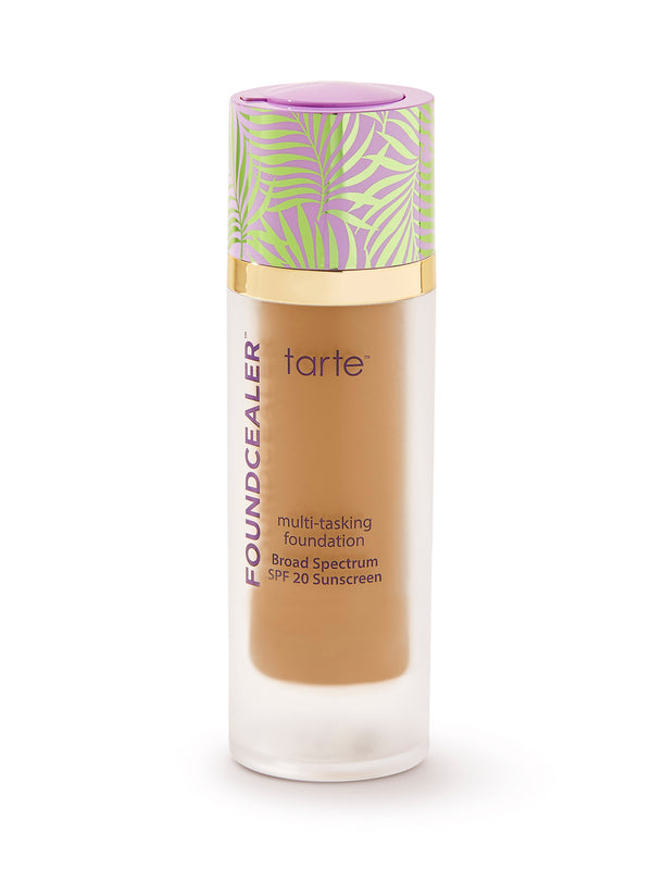 Tarte foundation bottle with a colorful cap on a white background