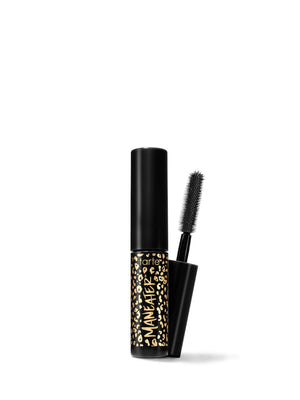 A travel-size mascara with a black tube and a brush applicator, featuring a gold and black pattern on the tube.