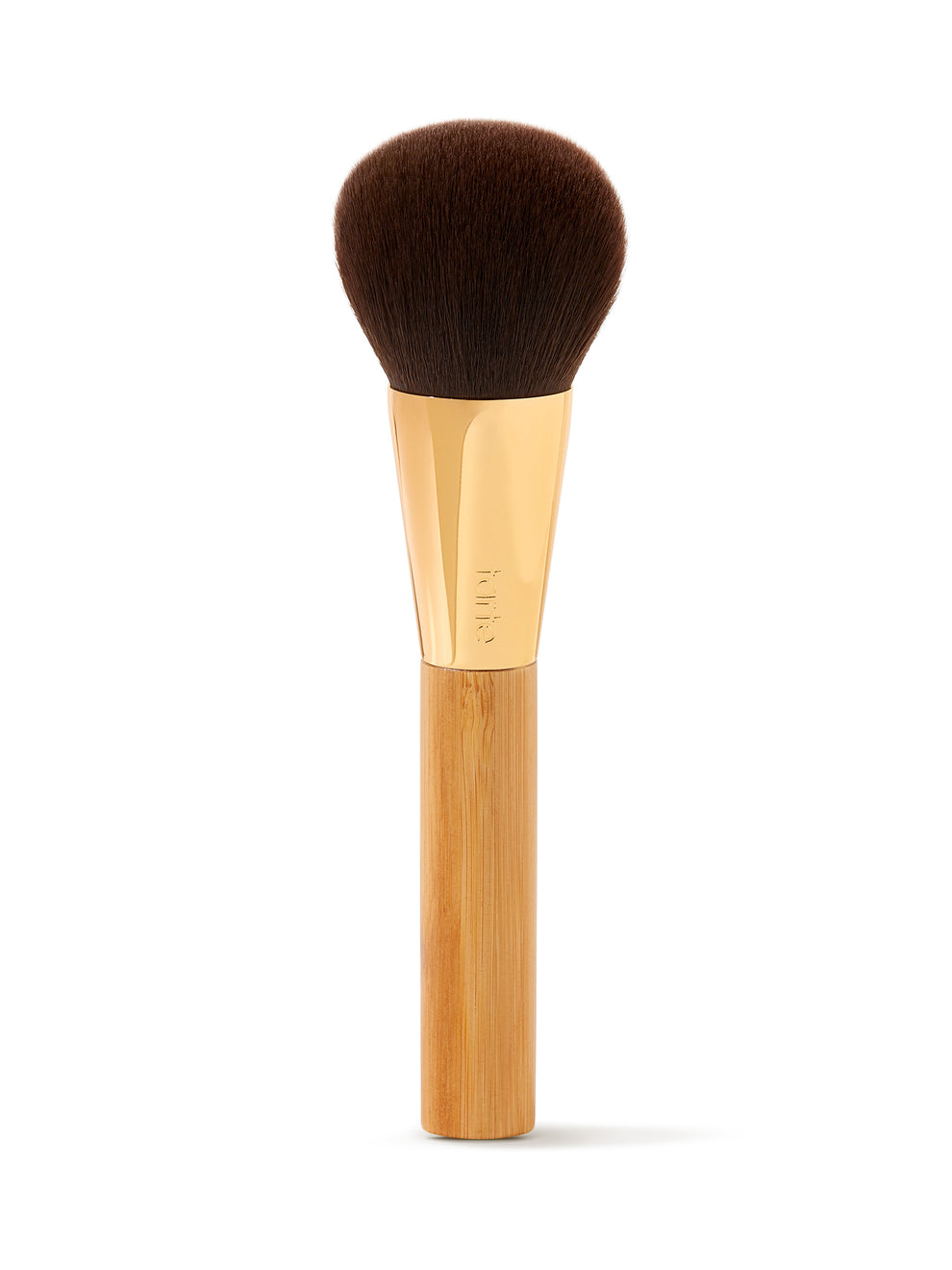 A large makeup brush stands upright. It has a shiny golden ferrule and a smooth wooden handle. The bristles are dense and rounded, providing a plush, full appearance.