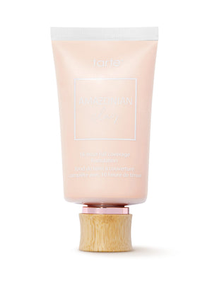 Cosmetic tube with wooden cap on a white background