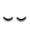 Pair of black false eyelashes on a white background
