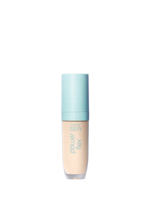 Foundation bottle with blue cap and beige body on a white background