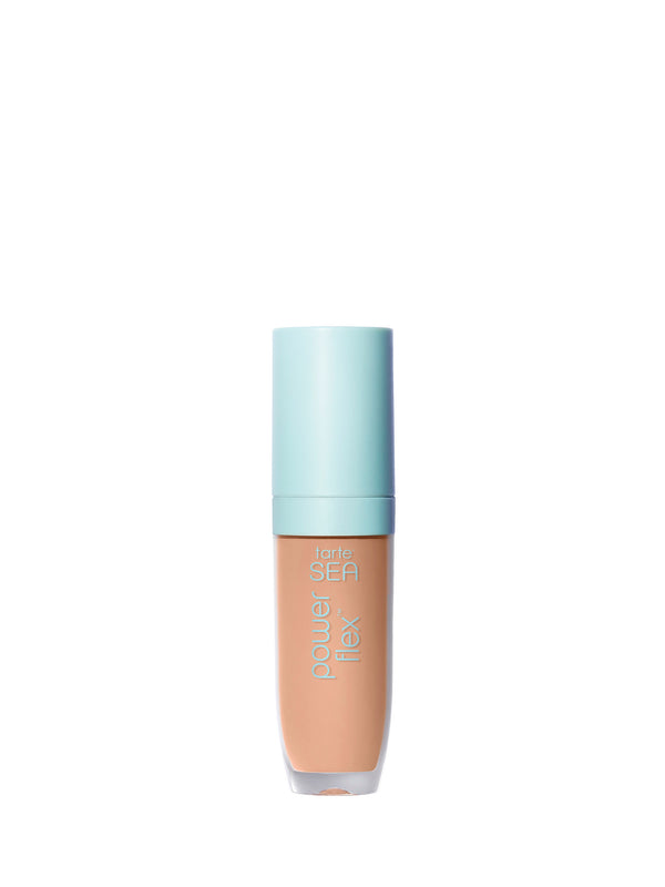Foundation bottle with light blue cap on a white background