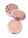 Compact powder with rose gold casing on a white background