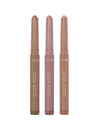 Three tarte quick stick lip products on a white background