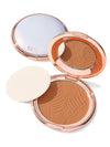 Compact powder with a zebra pattern and 'tarte' branding on a white background