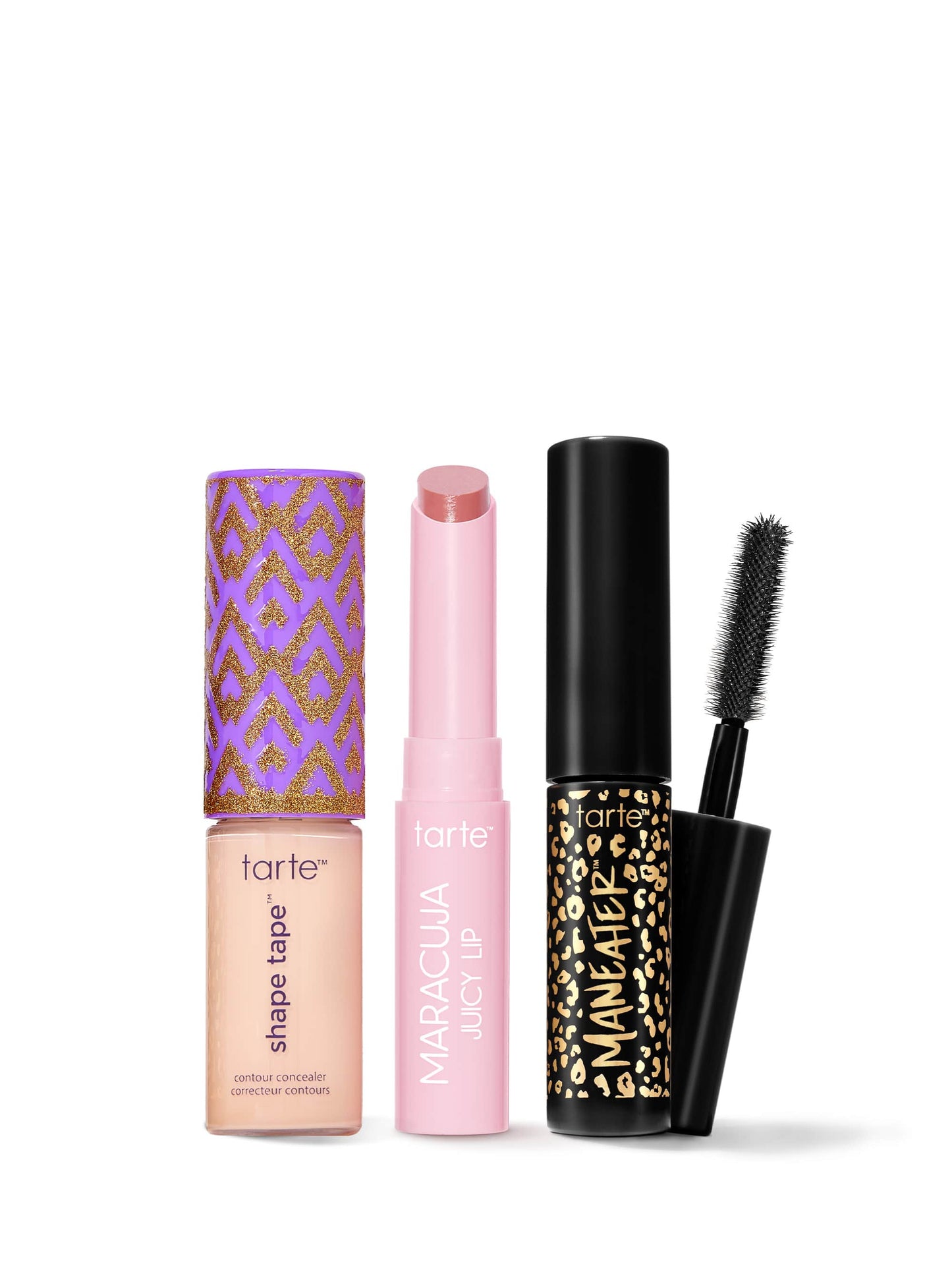 Set of tarte makeup products including a concealer, lip balm, and mascara on a white background