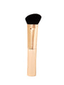 Makeup brush with black bristle head and rose gold handle on a white background
