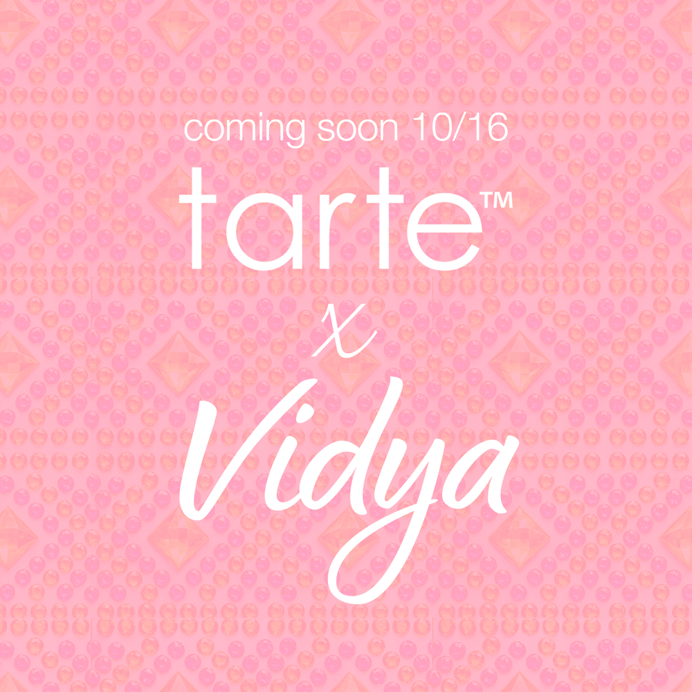 Text announces coming soon 10/16 Tarte x Vidya in white font on a pink, patterned background with geometric designs and dots, conveying an upcoming collaboration.